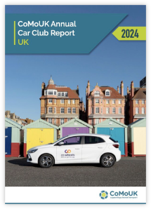 Front cover of the car club report 2024 featuring a white car in front of colourful seaside huts