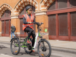 Lime adaptive bike being ridden in London